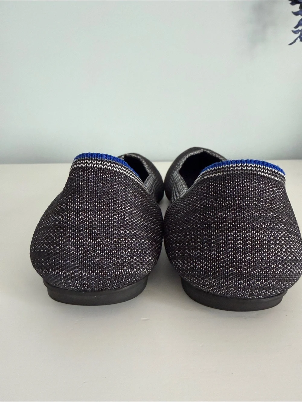 Rothy's Women's Black & White Knit Ballet Flat with Blue Trim